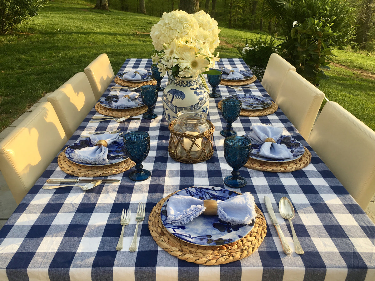 Layered blue-and-white place settings from the You Blue Me Away kit without vases