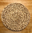 Woven water hyacinth placemats adding natural texture to a table setting