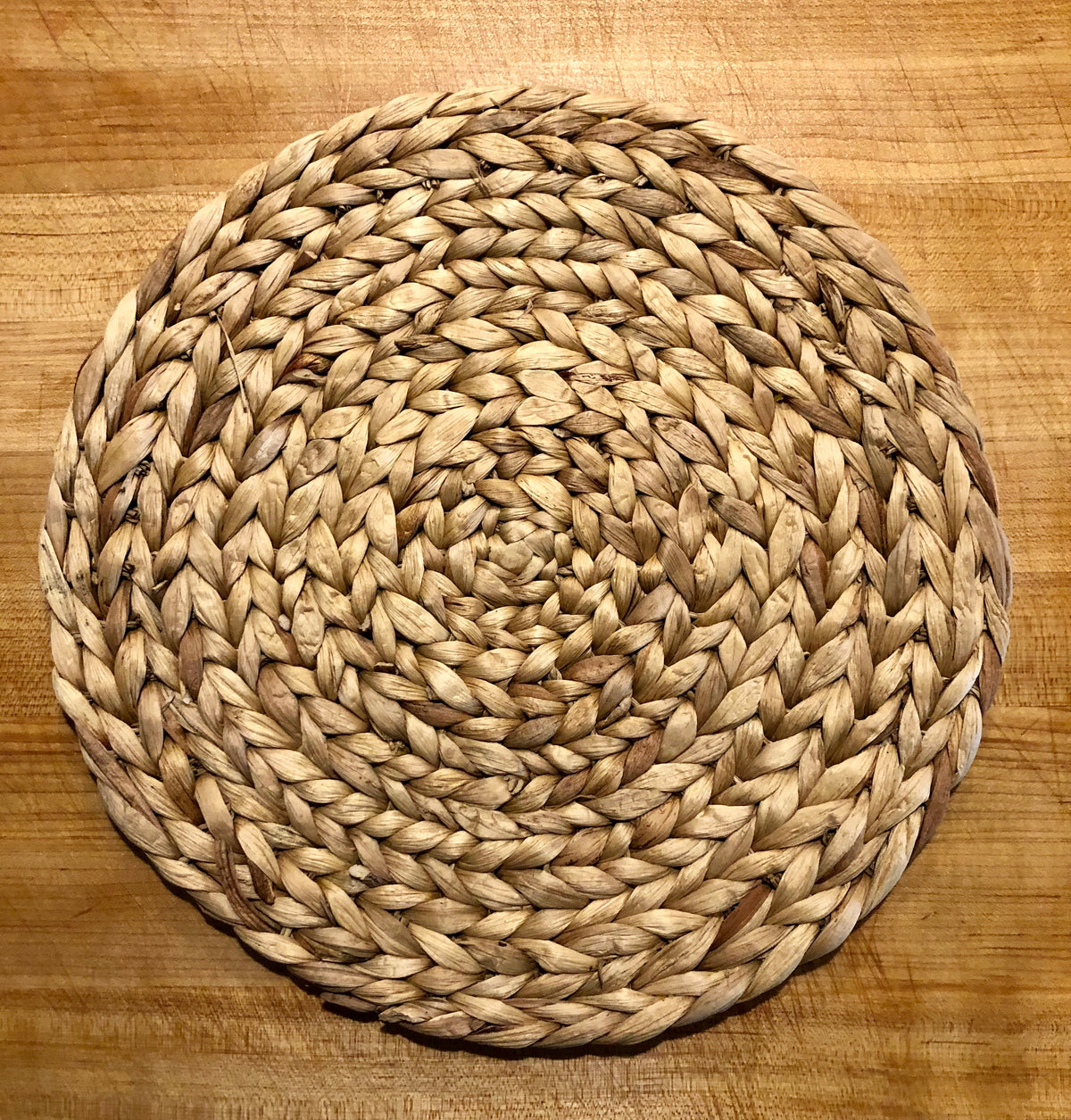 Woven water hyacinth placemats adding natural texture to a table setting