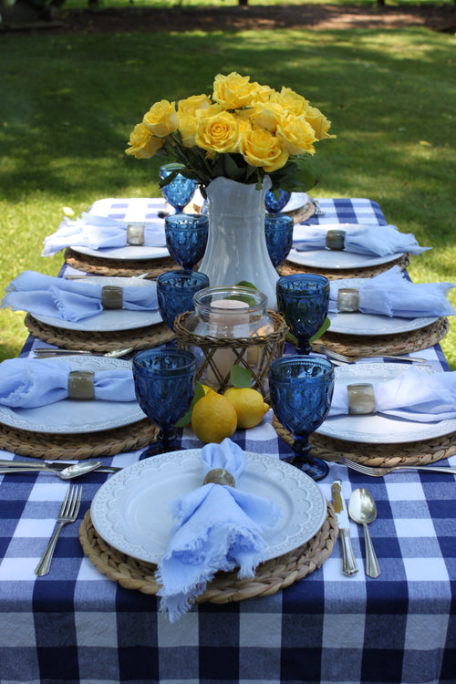 Blue gingham tablescape with blue napkins from the You Blue Me Away kit without vases