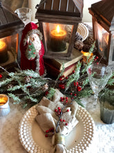 Cedar and sleigh bell glittered spray | Table Terrain winter table centerpieces, simple candle centerpieces, inexpensive table centerpieces