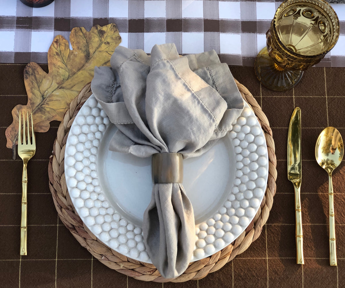 Natural water hyacinth placemats on a styled dining table