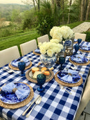 Layered blue-and-white place settings with vases from the You Blue Me Away tablescape kit