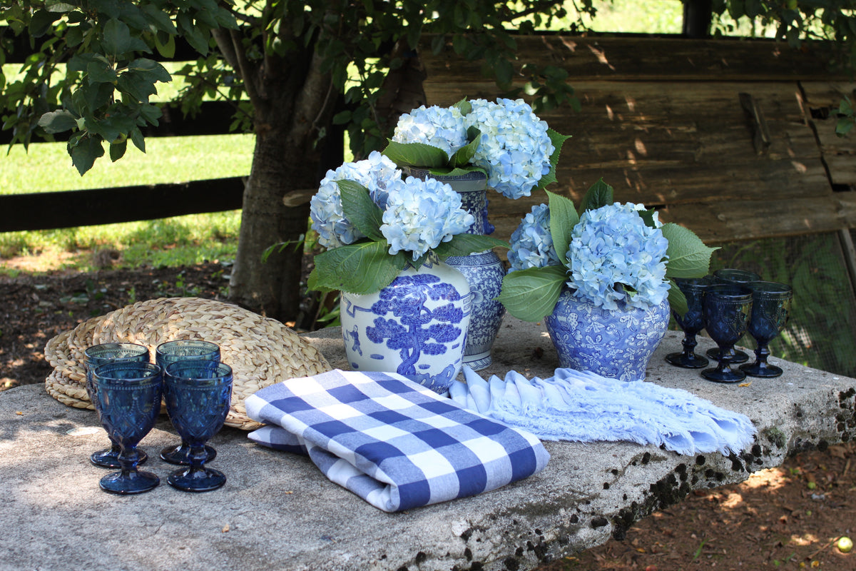 Blue gingham and linen tablescape from the You Blue Me Away kit without vases