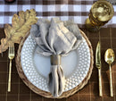 Natural horn napkin ring adding organic texture to a place setting